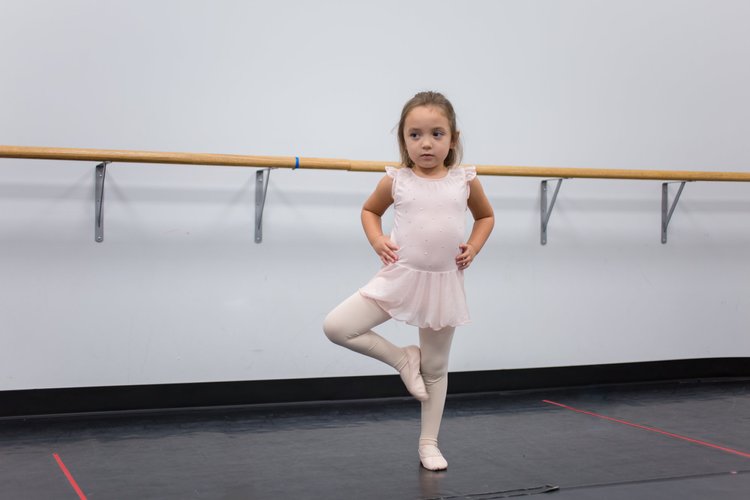 Preparatory students practicing ballet positions